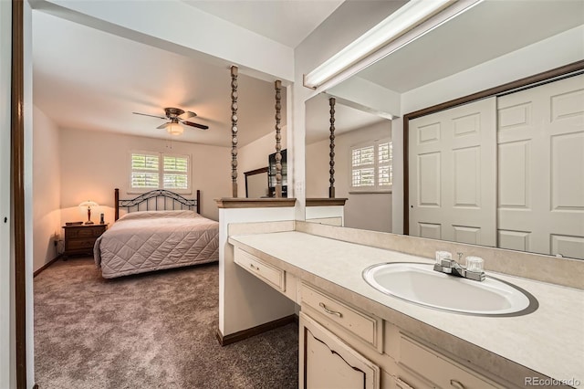 678 S Oswego Ct, Aurora, CO 80012 - ensuite bathroom featuring vanity, a ceiling fan, and baseboards