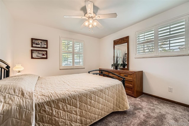 678 S Oswego Ct, Aurora, CO 80012 - bedroom featuring multiple windows, carpet flooring, baseboards, and a ceiling fan