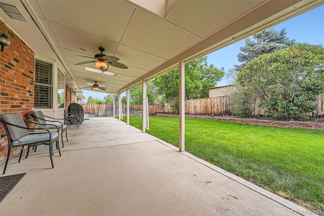 678 S Oswego Ct, Aurora, CO 80012 - view of patio featuring a ceiling fan