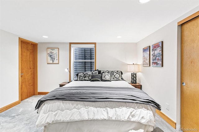 bedroom featuring a closet and carpet floors