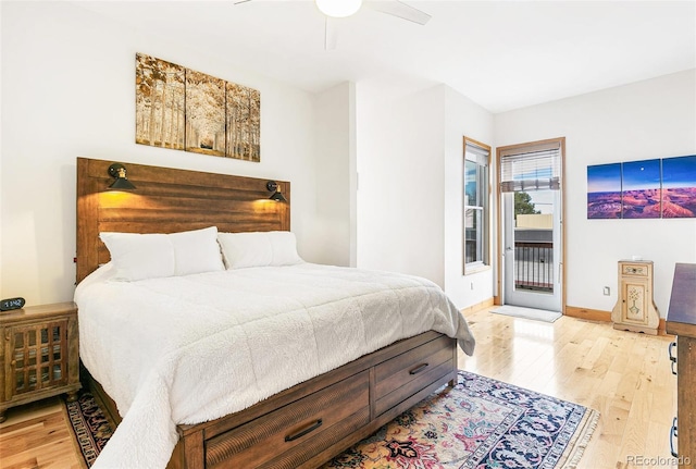 bedroom with ceiling fan, access to exterior, and light hardwood / wood-style flooring