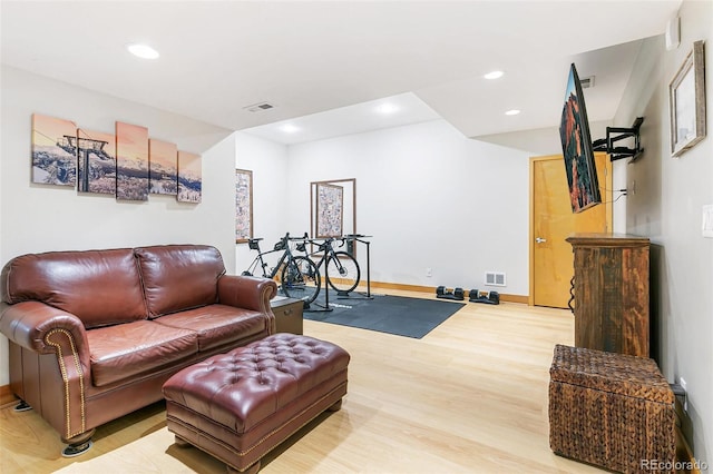 living room with light hardwood / wood-style flooring