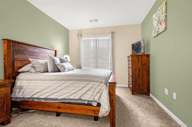 9390 W Chatfield Pl Unit 104, Littleton, CO 80128 - bedroom featuring baseboards, light carpet, and visible vents