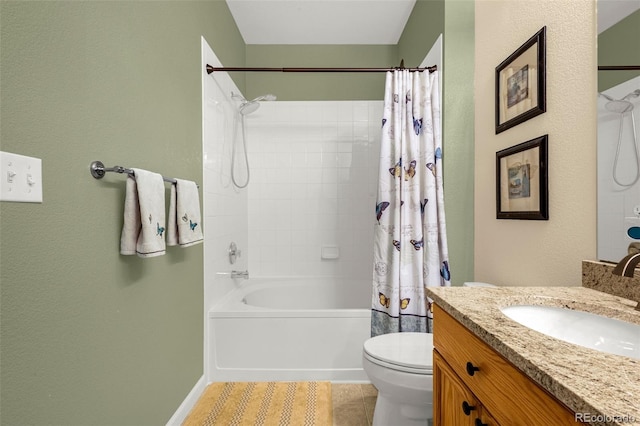 9390 W Chatfield Pl Unit 104, Littleton, CO 80128 - bathroom featuring toilet, baseboards, shower / tub combo with curtain, tile patterned floors, and vanity