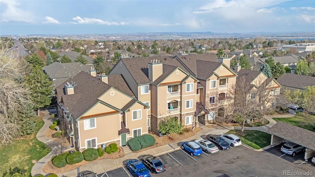 9390 W Chatfield Pl Unit 104, Littleton, CO 80128 - birds eye view of property featuring a residential view