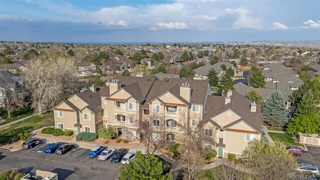 9390 W Chatfield Pl Unit 104, Littleton, CO 80128 - drone / aerial view with a residential view