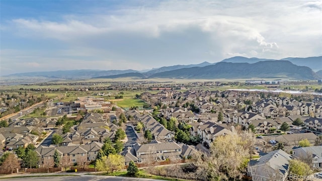 9390 W Chatfield Pl Unit 104, Littleton, CO 80128 - aerial view featuring a mountain view and a residential view