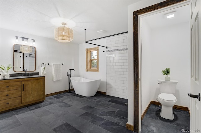 bathroom with baseboards, a tile shower, a soaking tub, and vanity