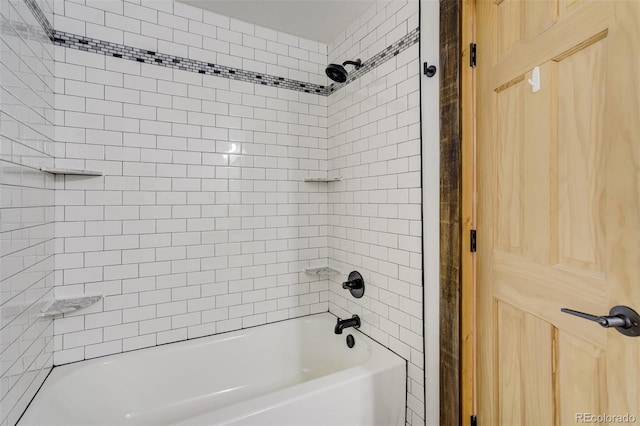 bathroom with shower / washtub combination