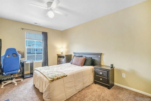 bedroom with light carpet, baseboards, a ceiling fan, and visible vents