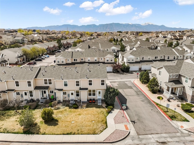 bird's eye view featuring a mountain view and a residential view