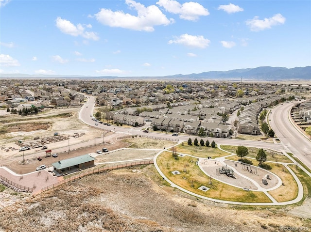 bird's eye view featuring a mountain view and a residential view