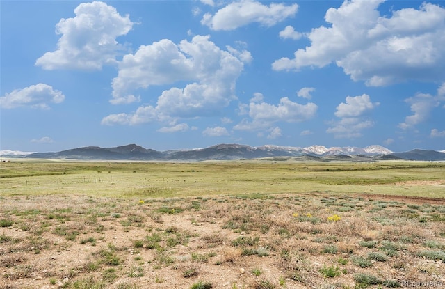 property view of mountains with a rural view