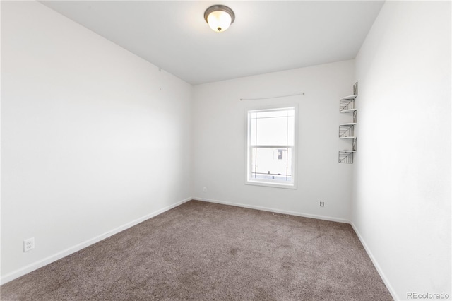 empty room featuring carpet flooring