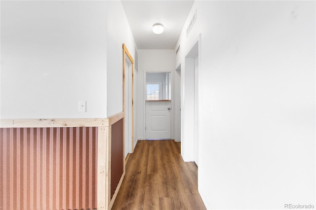 hallway featuring dark hardwood / wood-style floors