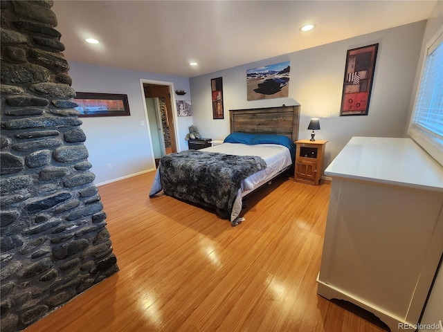 bedroom featuring hardwood / wood-style flooring