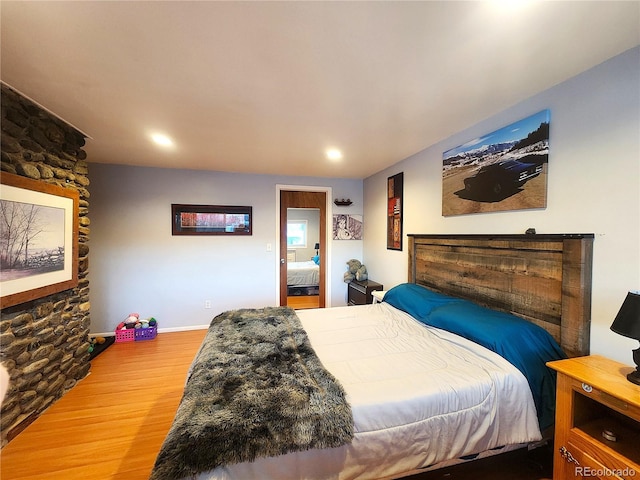 bedroom featuring hardwood / wood-style flooring