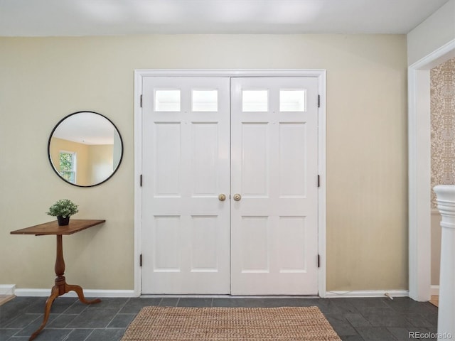 foyer with baseboards