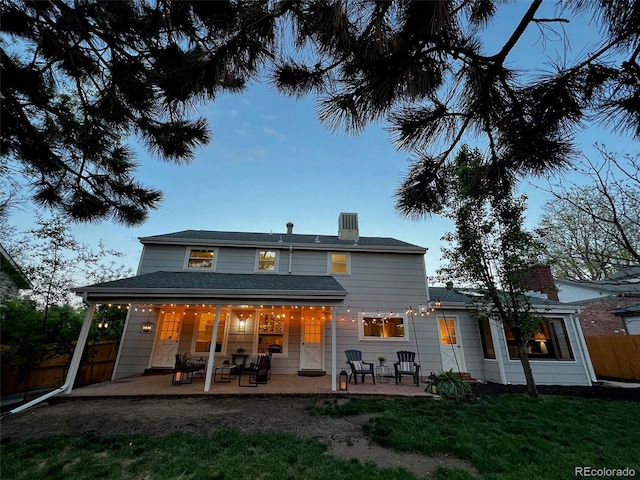 back of house featuring a patio