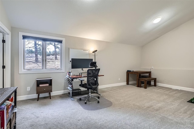 office space featuring carpet flooring and lofted ceiling