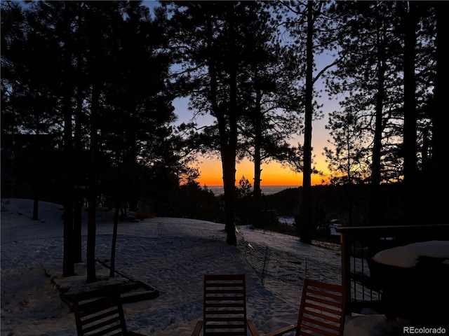 view of patio terrace at dusk