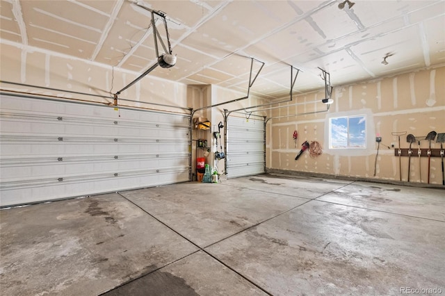 garage featuring a garage door opener