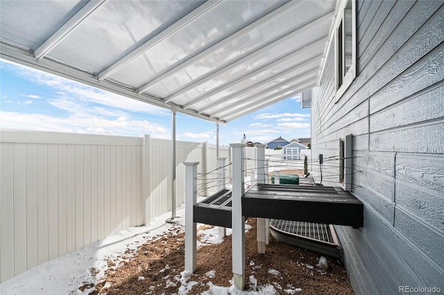 view of snow covered deck