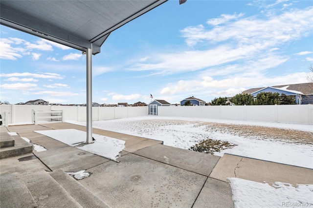 view of patio / terrace with a storage unit