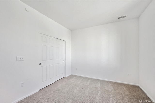 unfurnished bedroom with carpet flooring