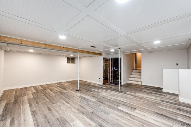 3111 Troy St, Aurora, CO 80011 - finished below grade area with baseboards, stairway, light wood-style flooring, and recessed lighting