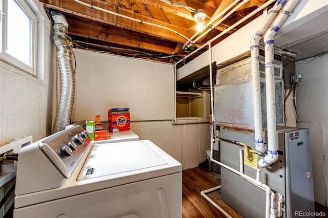 3111 Troy St, Aurora, CO 80011 - washroom featuring separate washer and dryer and wood finished floors
