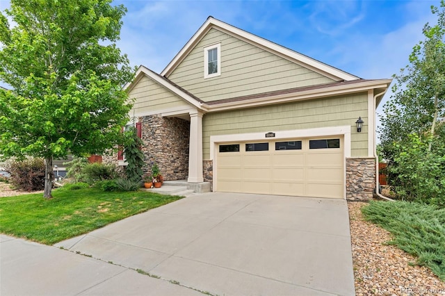 6046 Gilbert Way, Golden, CO 80403 - craftsman house with stone siding, driveway, and a front lawn