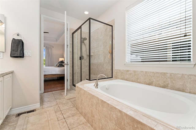 6046 Gilbert Way, Golden, CO 80403 - bathroom with a bath, a stall shower, ensuite bathroom, and plenty of natural light