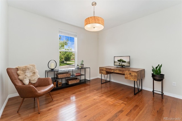6046 Gilbert Way, Golden, CO 80403 - sitting room featuring wood finished floors and a desk