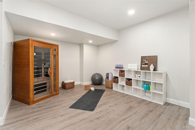 6046 Gilbert Way, Golden, CO 80403 - workout area with wood finished floors and recessed lighting