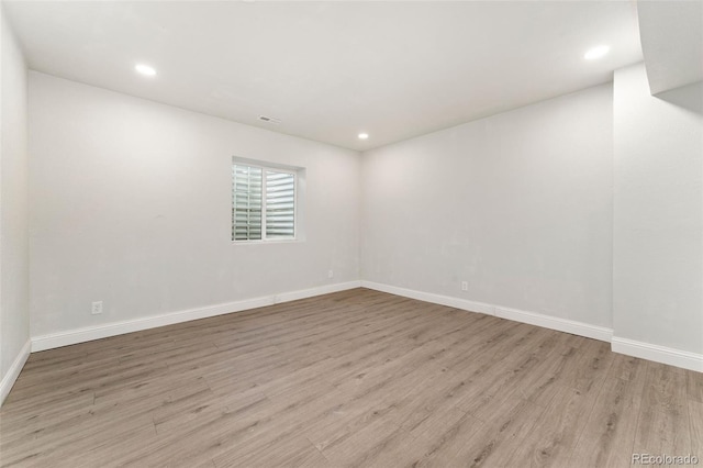 6046 Gilbert Way, Golden, CO 80403 - spare room with wood finished floors and recessed lighting