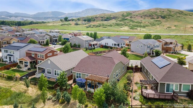 6046 Gilbert Way, Golden, CO 80403 - aerial perspective of suburban area with mountains