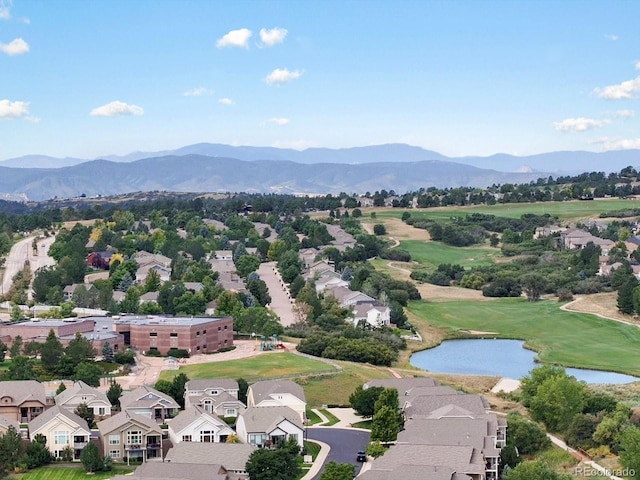 bird's eye view with a water and mountain view