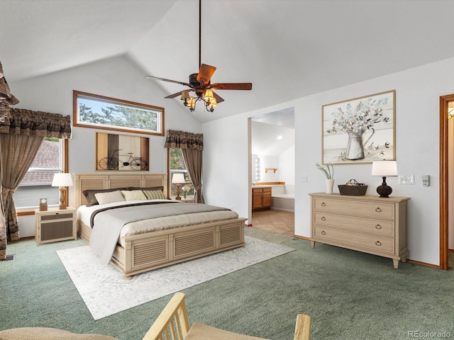 bedroom featuring carpet flooring, ceiling fan, ensuite bathroom, and multiple windows