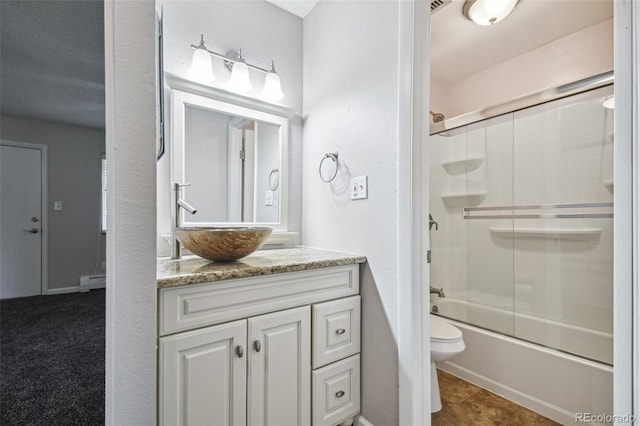 full bathroom featuring toilet, vanity, and enclosed tub / shower combo
