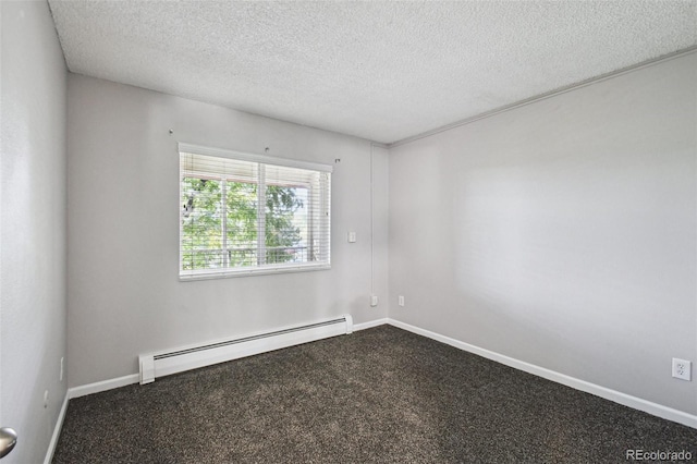 empty room with baseboards, dark colored carpet, a textured ceiling, and baseboard heating