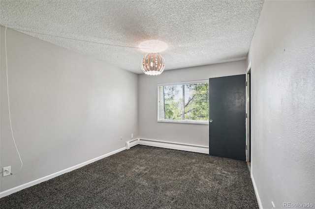 unfurnished room featuring baseboard heating, a textured ceiling, an inviting chandelier, baseboards, and dark colored carpet