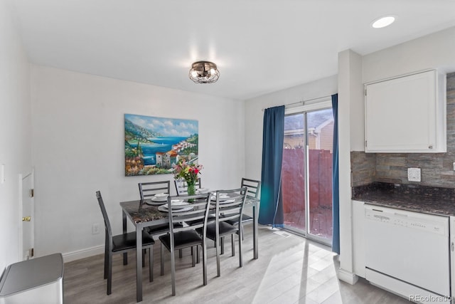 dining room featuring light hardwood / wood-style floors