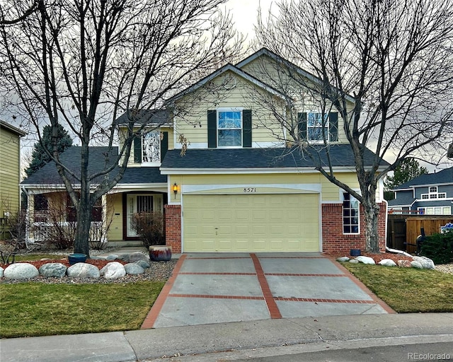 front facade with a garage