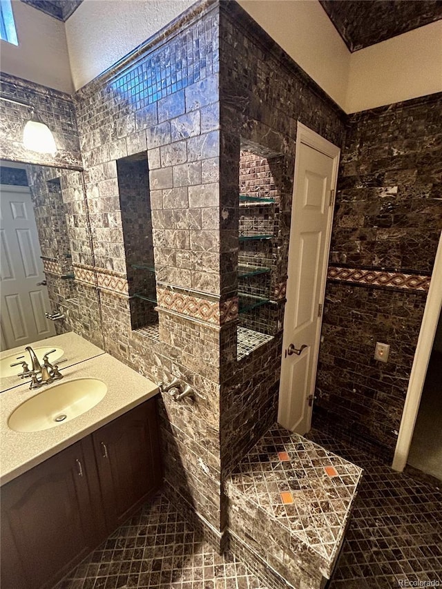 bathroom with vanity and tile patterned flooring