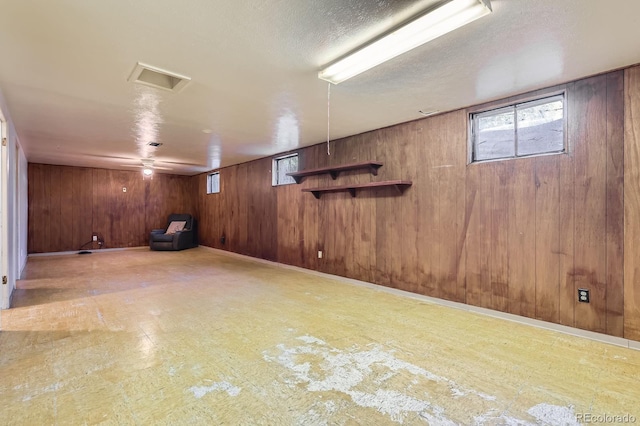1750 S Dale Ct, Denver, CO 80219 - basement featuring wooden walls