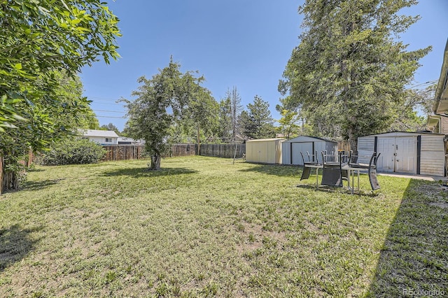 1750 S Dale Ct, Denver, CO 80219 - fenced backyard with a shed