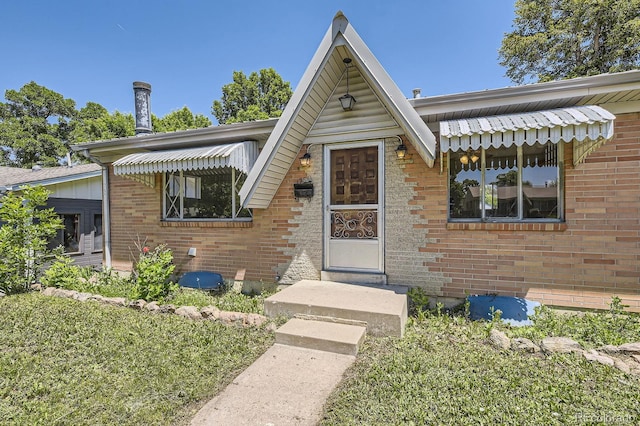1750 S Dale Ct, Denver, CO 80219 - view of front of house featuring brick siding