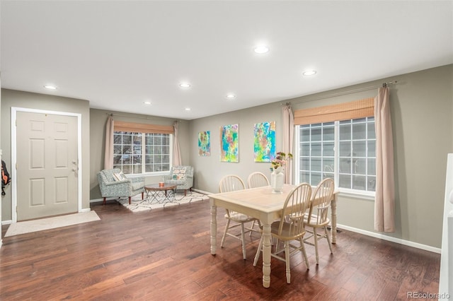 dining room featuring recessed lighting, baseboards, and wood finished floors