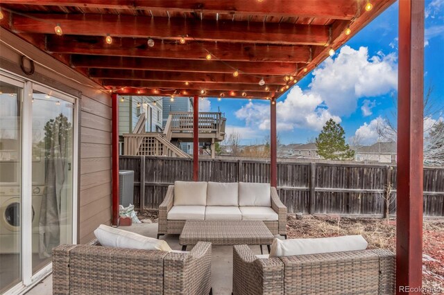 view of patio featuring a fenced backyard and an outdoor hangout area